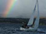 Anche qui una bella foto di repertorio, Gris� ITA235, la mitica barca dei Vigili del Fuoco, a fianco ad uno spettacolare arcobaleno