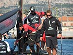 LNI Sulcis - Il team di Emirates New Zealand prepara la barca