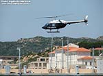 LNI Sulcis - L'elicottero dei Carabinieri decolla da uno dei tre punti d'atterraggio previsti all'interno del villaggio del Vuitton Trophy